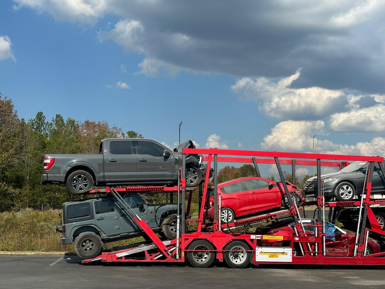Modern car carrier truck loaded with vehicles