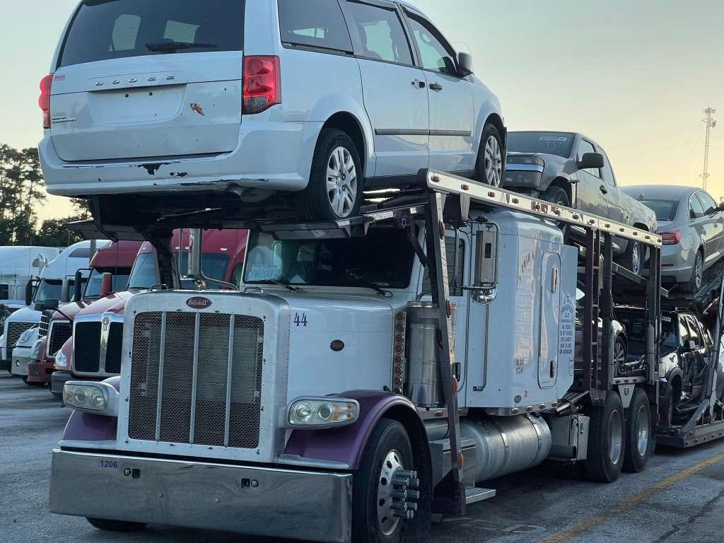Multi-level car carrier with loaded vehicles